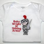 Onesie/Applique Knight/Name Included in the price.  Additional Writing Extra