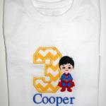 This superman hero is completely embroidered.  It is NOT an applique.  You can choose any applique number to add to it.  Please add $5.00 to the cost of this design due to the number of stitches involved.  Includes name too!